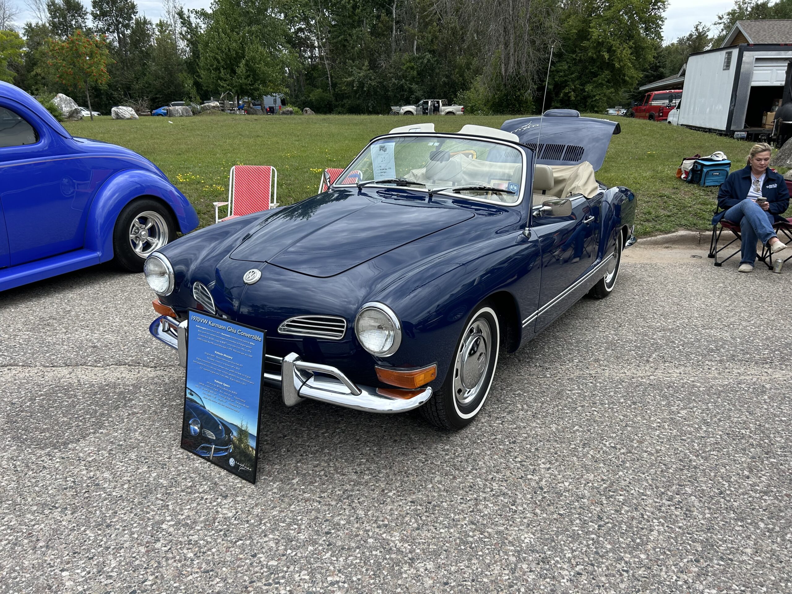 A blue 1970 VW Karmann Ghia Convertible.